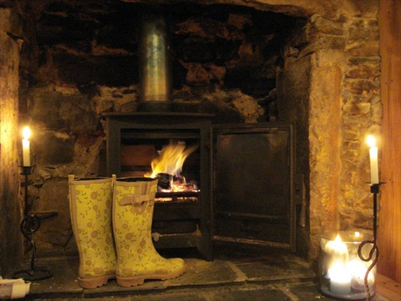 cosy fireplace with real fire