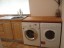 utility room with washing machine and dryer